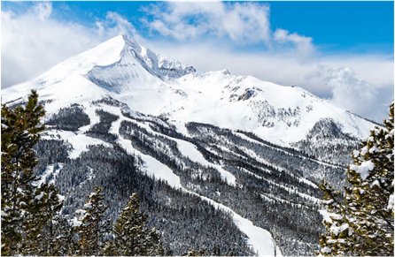 Snowy mountain peak on a sunny day