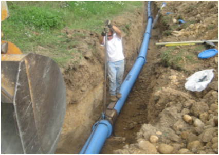 Pipe being installed in ground