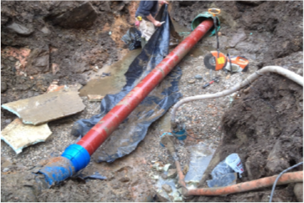 Pipe being installed in ground